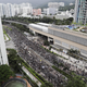 Protesters march through the Sha Tin District in Hong Kong, July 14, 2019.